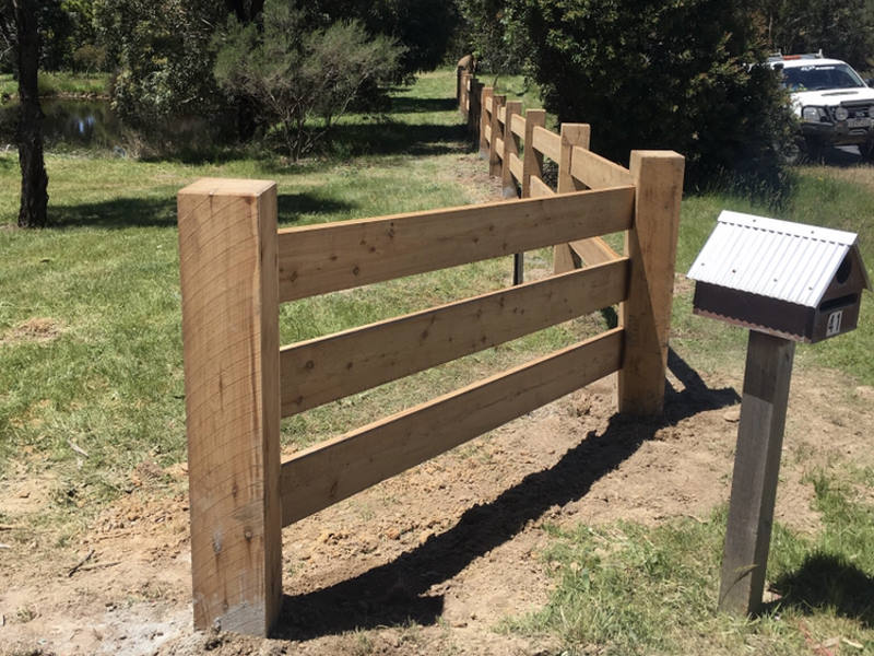 Cypress post and 3 rail fencing