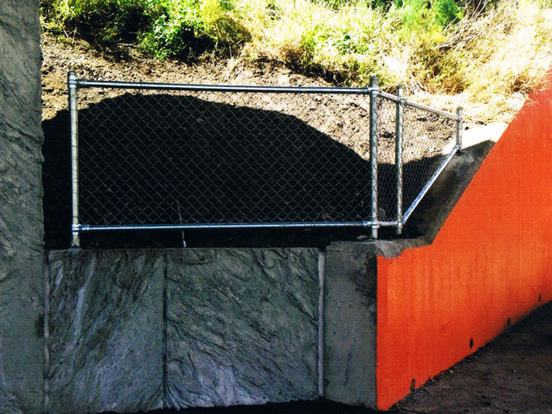 Fencing Epping - Chain mesh fencing barrier Dyna bolted to concrete beam