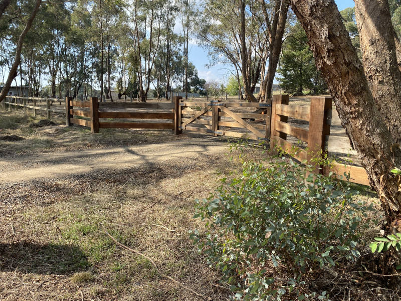 Red gum post and rail fence